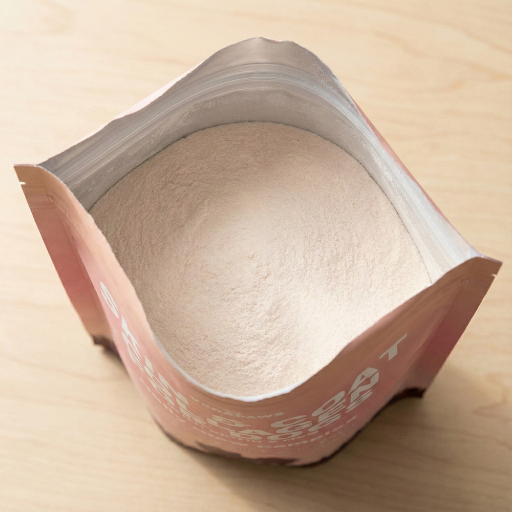 Unopened package of Skin and Coat Collagen For Dogs on a wooden surface